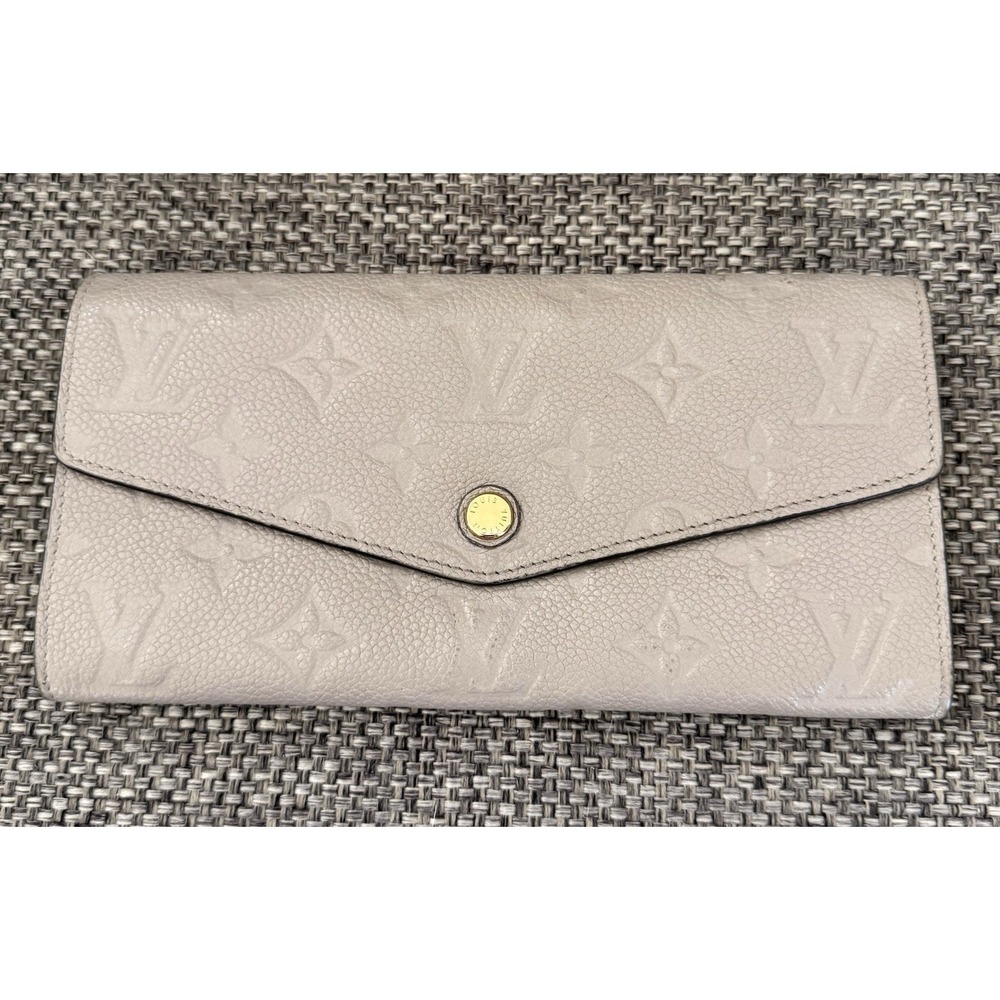 LOUIS VUITTON Monogram Empreinte Portefeuille Sarah Long wallet. Box And COA